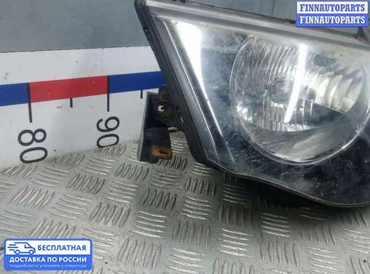 Фара передняя на Mitsubishi L200 (KA, KB)