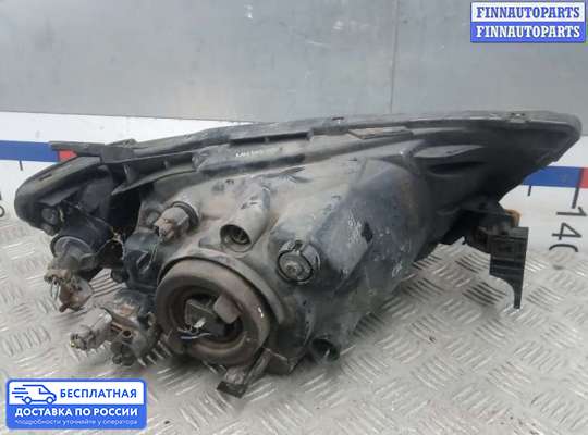 Фара передняя на Mitsubishi L200 (KA, KB)