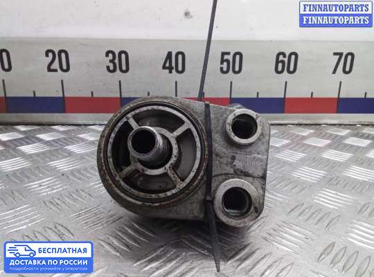 Корпус масляного фильтра на Nissan Qashqai I (J10)