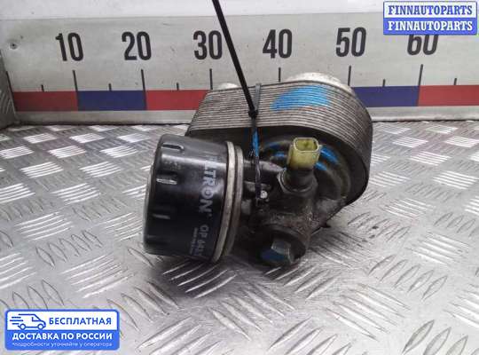 Корпус масляного фильтра на Nissan Qashqai I (J10)