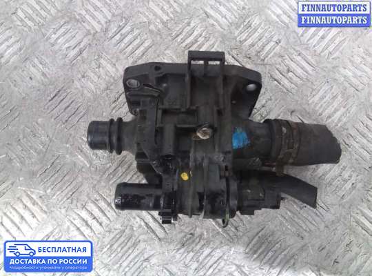 Корпус термостата на Ford Focus II