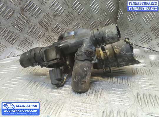 Корпус термостата на Nissan Qashqai I (J10)