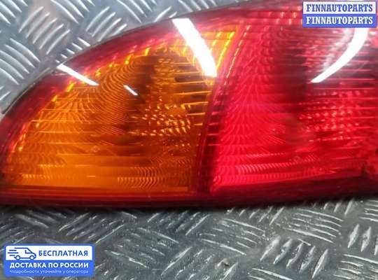 Фонарь задний на Ford Focus I