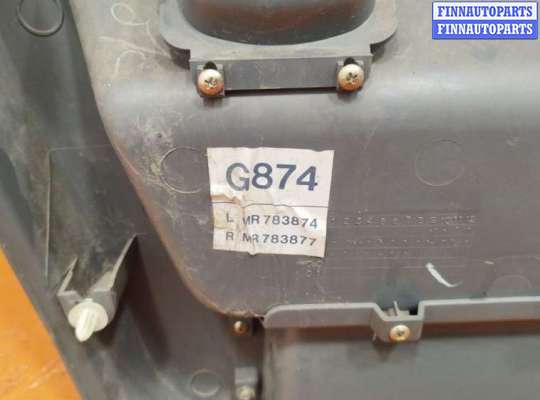 купить Обшивка двери передней правой (дверная карта) на Mitsubishi Space Runner