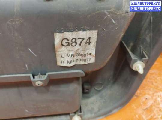 купить Обшивка двери передней левой (дверная карта) на Mitsubishi Space Runner