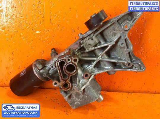 Корпус масляного фильтра на Skoda Superb II (3T)