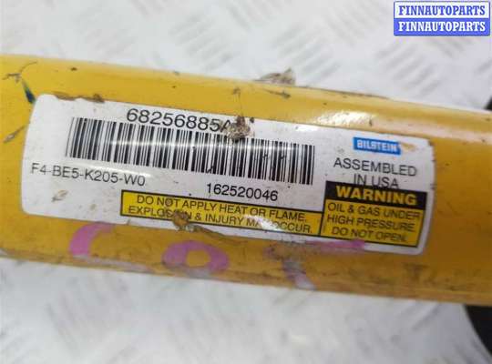 купить Амортизатор передний левый на Jeep Grand Cherokee