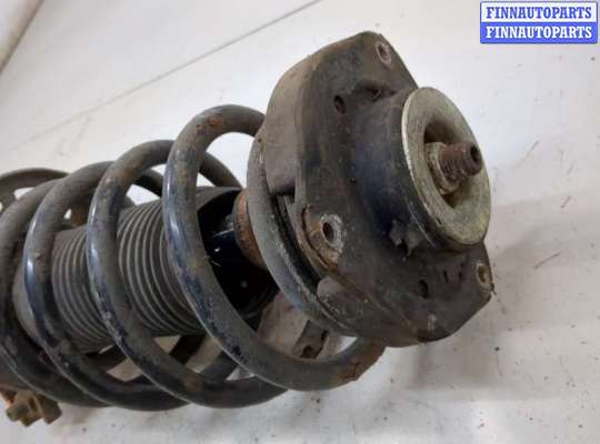 купить Амортизатор подвески на Volkswagen Touran 2006-2010