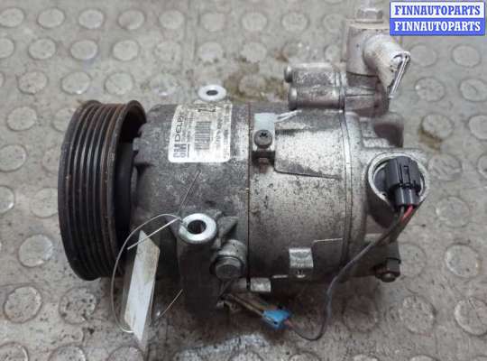 Компрессор кондиционера OP2359685 на Opel Astra J 2010-2017