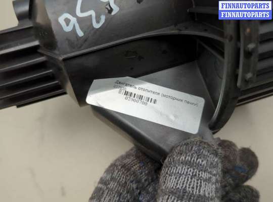 Мотор отопителя на Opel Zafira B