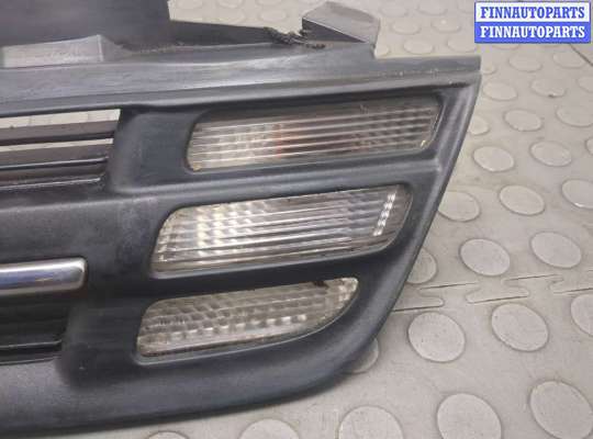 купить Решетка радиатора на Nissan Micra K12E 2002-2010