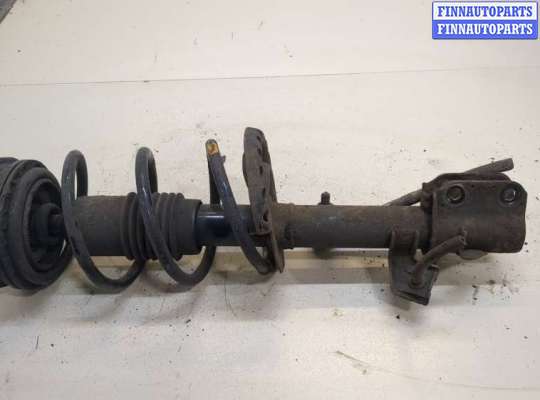 купить Амортизатор подвески на Nissan Note E11 2005-2013