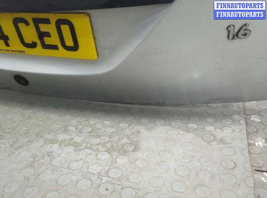 Планка подсветки номера на Ford Focus I