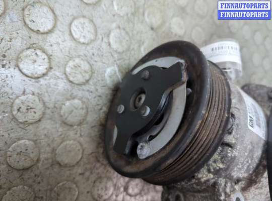 Компрессор кондиционера на Opel Astra J