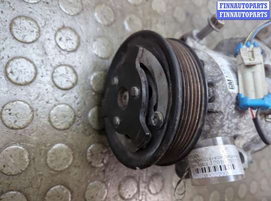 Компрессор кондиционера на Opel Astra J