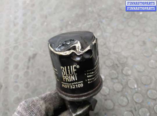 Корпус масляного фильтра на Toyota Vitz P1