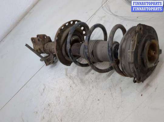 купить Амортизатор подвески на Nissan Note E11 2005-2013