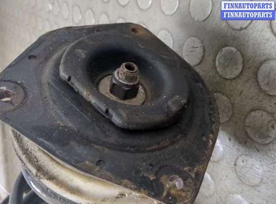 купить Амортизатор подвески на Nissan Note E11 2005-2013
