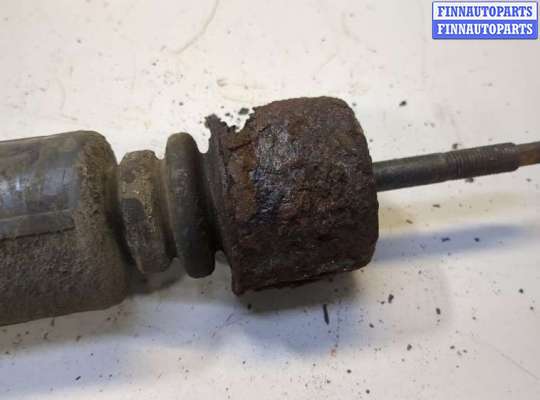 купить Амортизатор подвески на Nissan Tiida 2004-2010