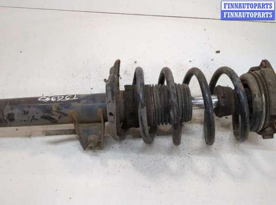 купить Амортизатор подвески на Volkswagen Touran 2006-2010