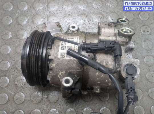 Компрессор кондиционера OP2424034 на Opel Astra J 2010-2017