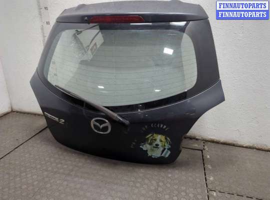 купить Обшивка крышки (двери) багажника на Mazda 2 2007-2014