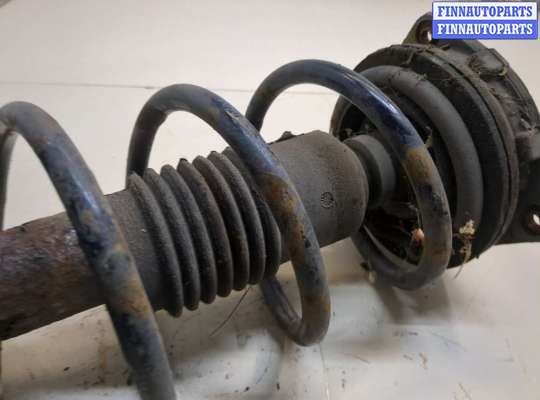 купить Амортизатор подвески на Nissan Note E11 2005-2013