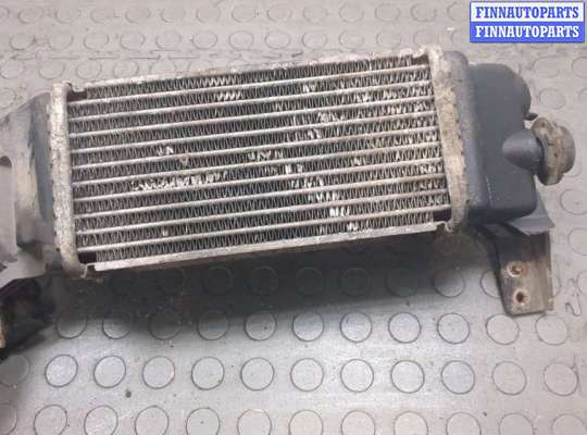 купить Радиатор интеркулера на Mazda 323 (BJ) 1998-2003
