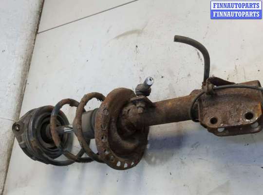 купить Амортизатор подвески на Nissan Note E11 2005-2013