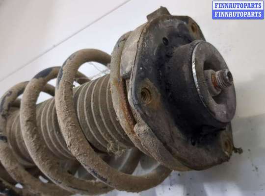 купить Амортизатор подвески на Volkswagen Touran 2003-2006