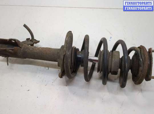 купить Амортизатор подвески на Nissan Almera N16 2000-2006