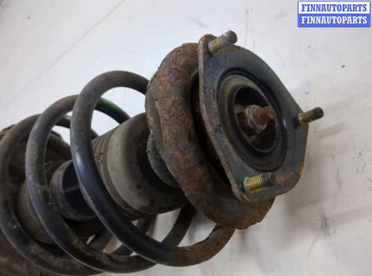 купить Амортизатор подвески на Nissan Almera N16 2000-2006