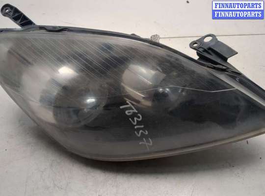 Фара (передняя) OP2429853 на Opel Zafira B 2005-2014
