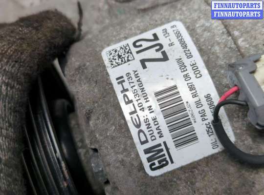 Компрессор кондиционера на Opel Astra J