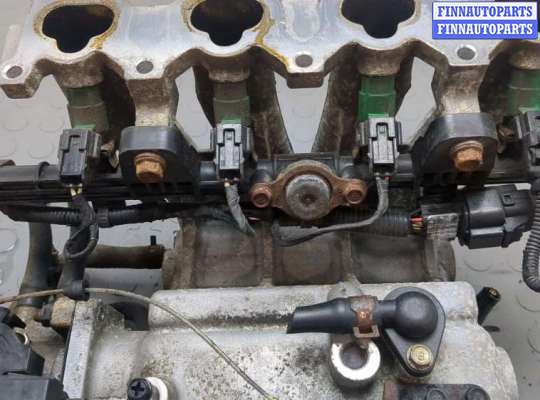 Коллектор впускной на Kia Rio II (JB)