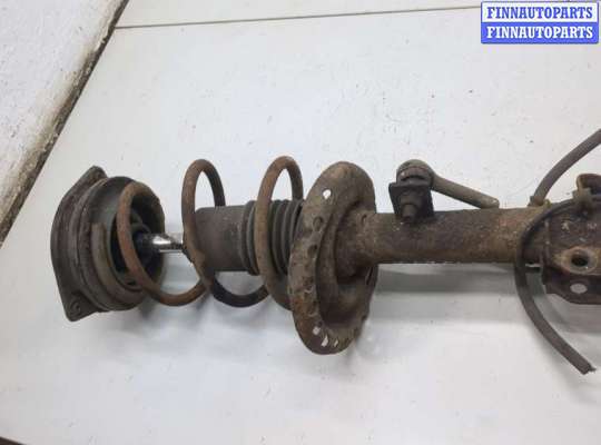 купить Амортизатор подвески на Nissan Note E11 2005-2013