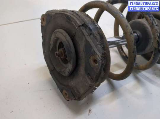 купить Амортизатор подвески на Renault Scenic 2009-2012