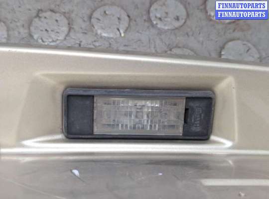 Планка подсветки номера на Nissan Primera (P12)