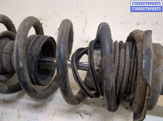 купить Амортизатор подвески на Nissan Almera N16 2000-2006