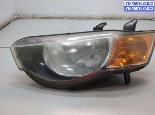 Фара (передняя) MT573838 на Mitsubishi Colt 2002-2012