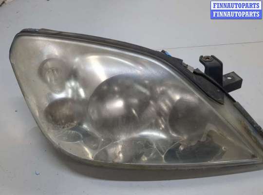 Фара передняя на Nissan Primera (P12)