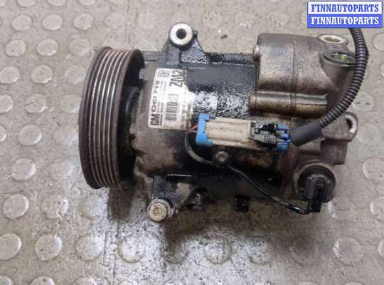 Компрессор кондиционера OP2433231 на Opel Astra J 2010-2017