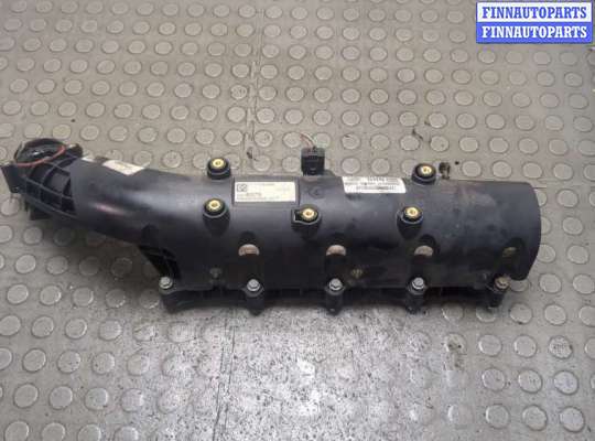 Коллектор впускной OP2435530 на Opel Astra J 2010-2017