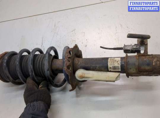 Стойка подвески амортизационная на Opel Zafira B