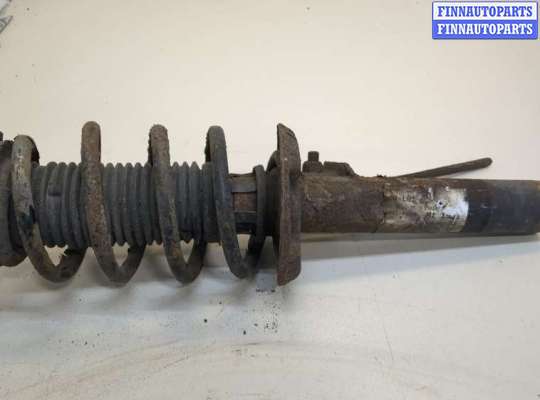 купить Амортизатор подвески на Volkswagen Tiguan 2007-2011