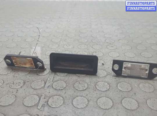 Планка подсветки номера на Ford Focus II