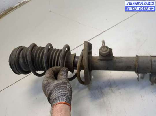 Стойка подвески амортизационная на Opel Corsa D