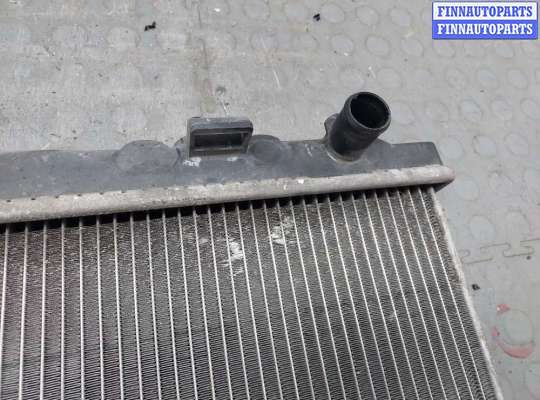 Радиатор основной на Nissan Tino V10