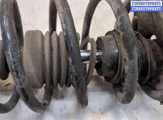 купить Амортизатор подвески на Nissan Almera N16 2000-2006