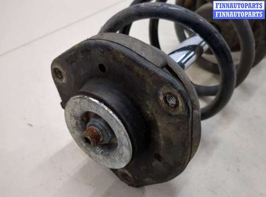 купить Амортизатор подвески на Volkswagen Tiguan 2007-2011